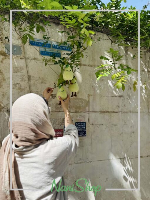 عروسک گلابی پادار