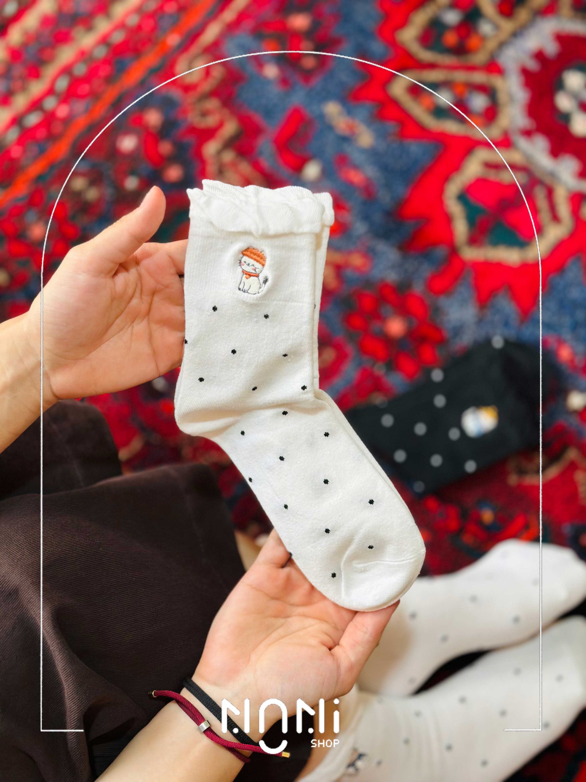 جوراب نیم ساق لبه چین گلدوزی طرح پیشی